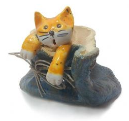Pottery Cat in a metalic coloured sack
